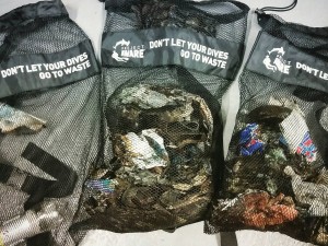 Divers filled their Project AWARE mesh bags