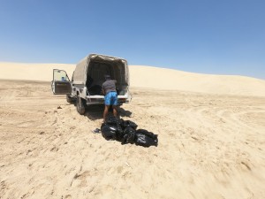 load the truck with trash