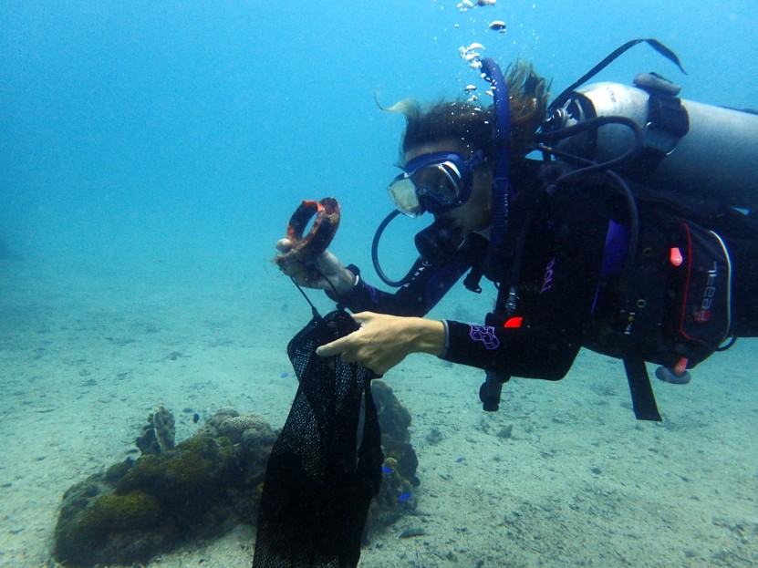 Collecting plastic from Lighthouse reef