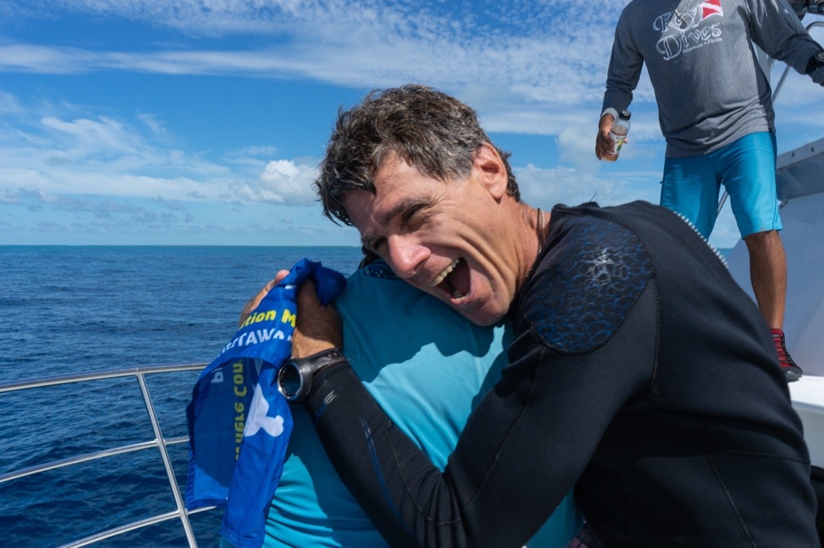 Key Dives owner Mike Goldberg hugs I.Care founder Kylie Smith after a successful Dive Against Debris
