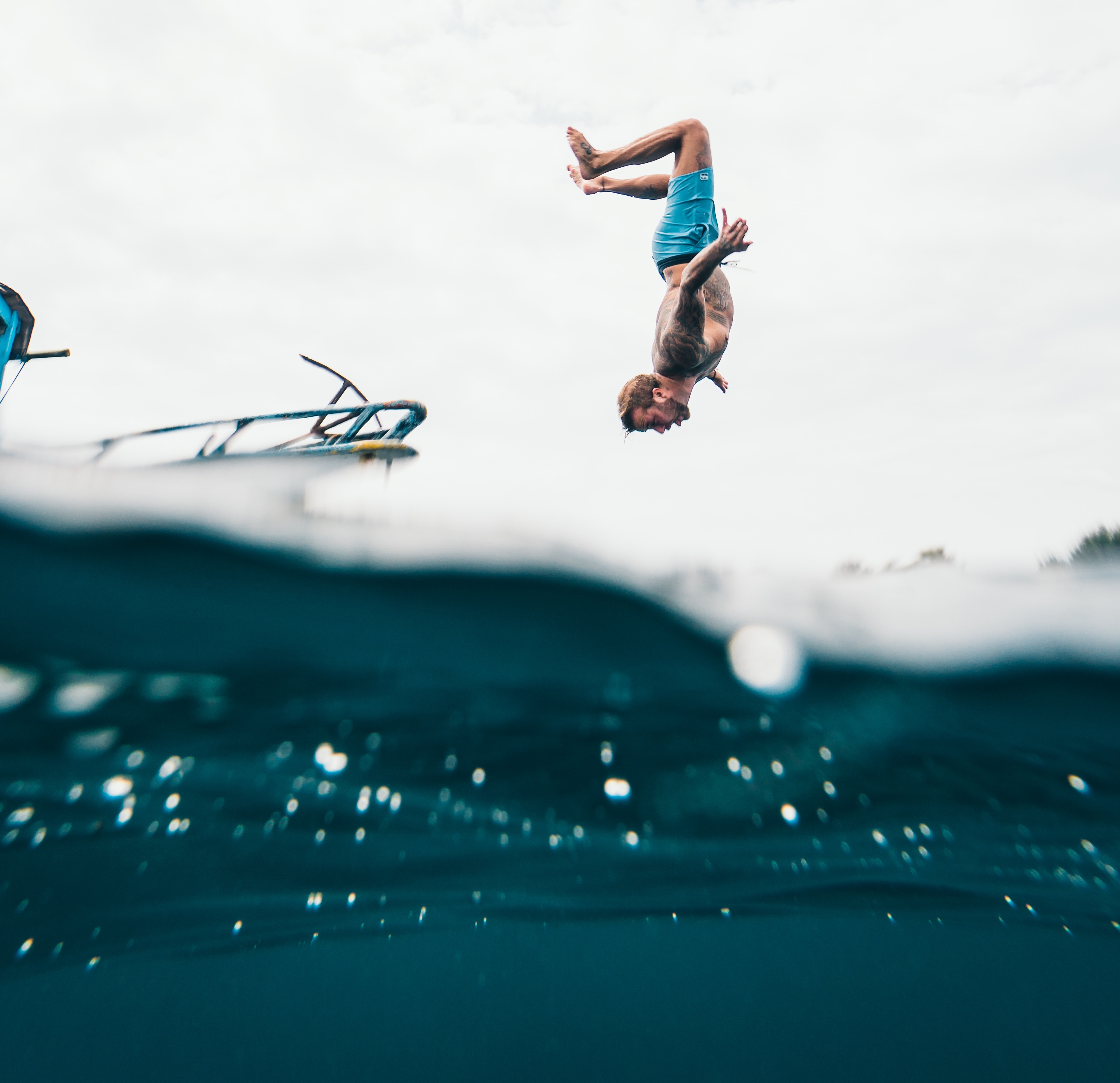Man jumping into sea