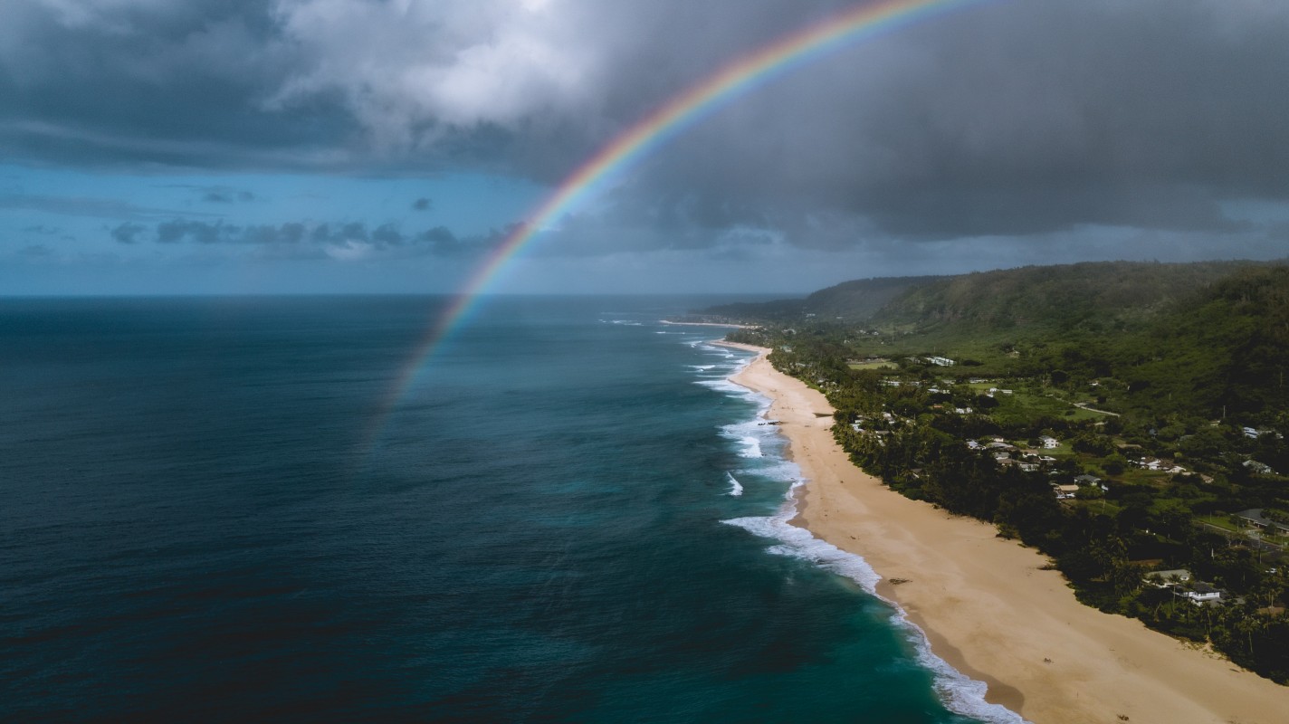 image of ocean rainbow via unsplash