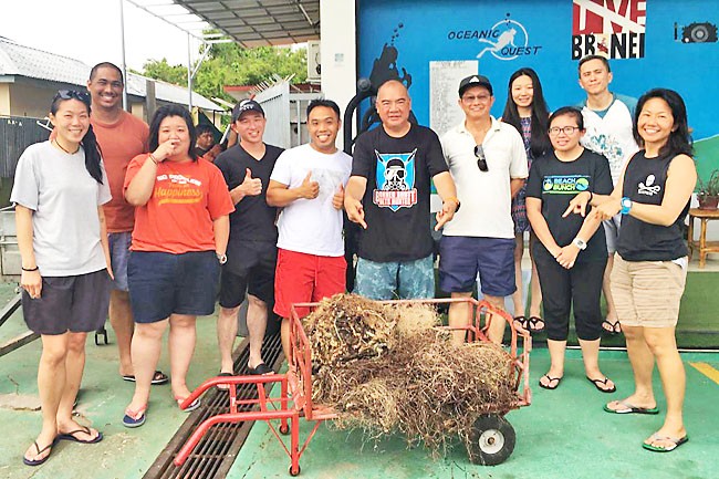 Divers showcase ghost nets removed from the waters. PHOTO: REEF CHECK BRUNEI