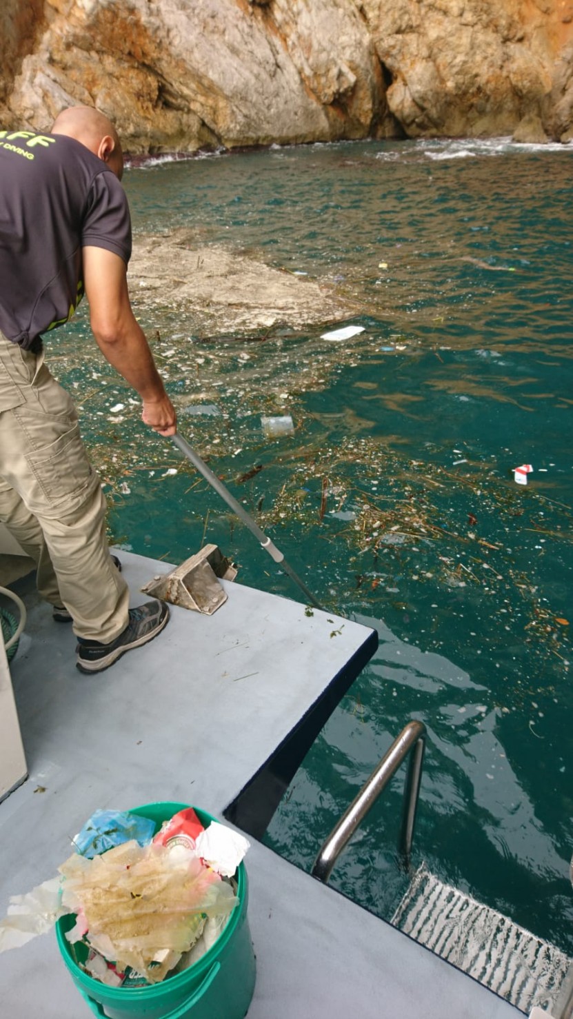 Joan cleaning from the boat