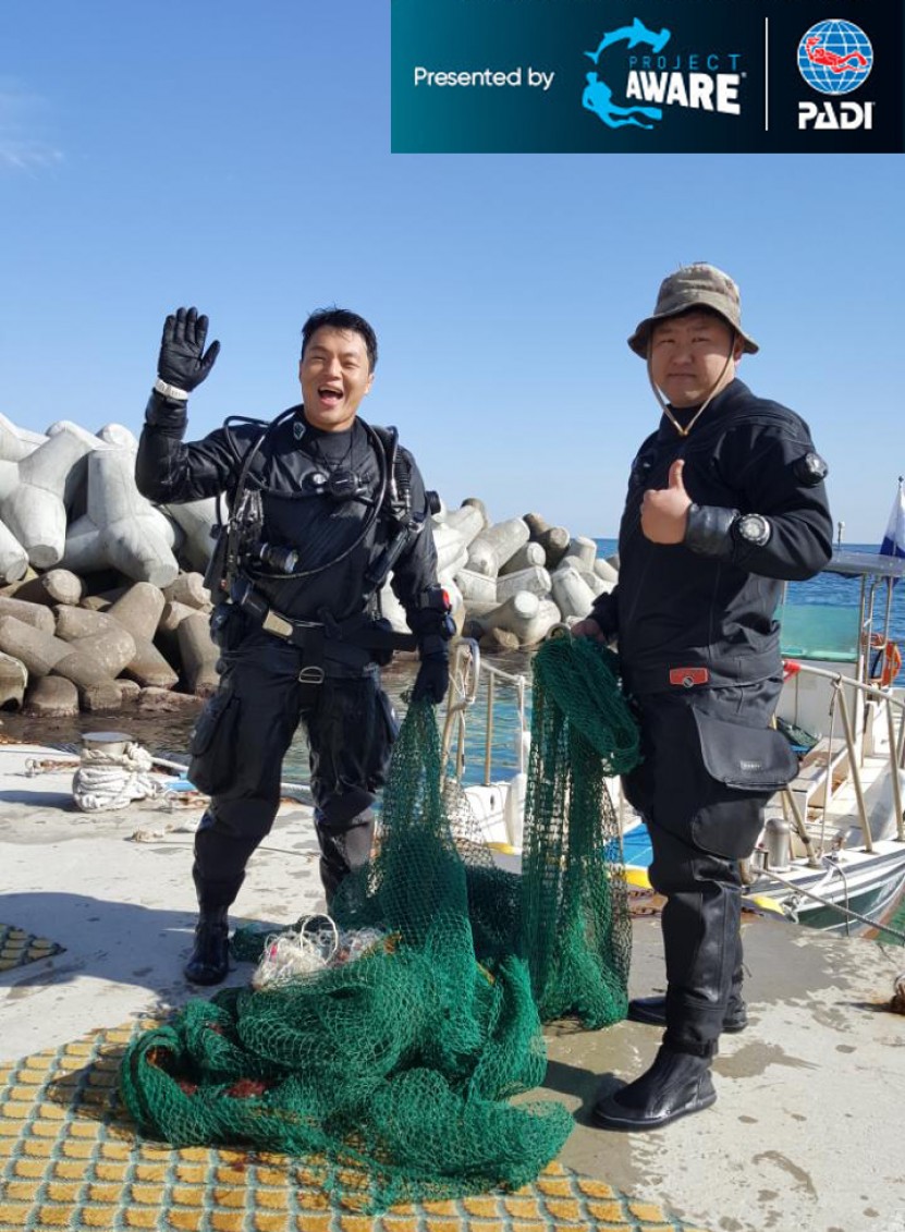 A large net was threatening the diver in underwater.