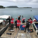 Armed with bags the divers get ready